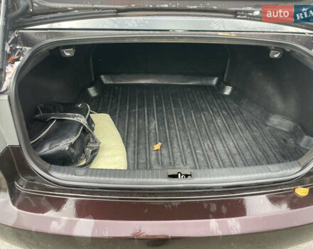 Коричневий Кіа Маджентіс, об'ємом двигуна 2 л та пробігом 170 тис. км за 6808 $, фото 5 на Automoto.ua