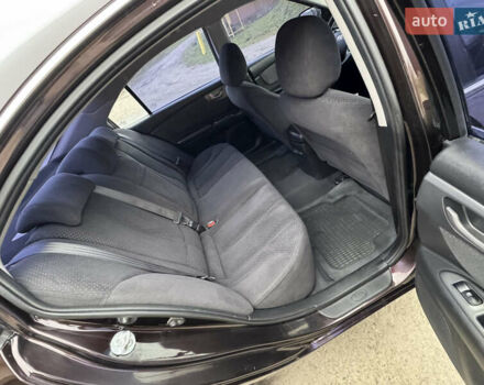 Коричневий Кіа Маджентіс, об'ємом двигуна 2 л та пробігом 157 тис. км за 5900 $, фото 28 на Automoto.ua