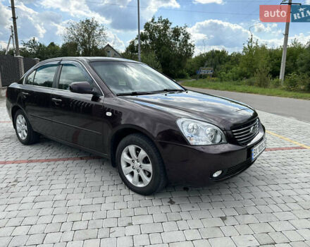 Коричневий Кіа Маджентіс, об'ємом двигуна 2 л та пробігом 255 тис. км за 5500 $, фото 9 на Automoto.ua