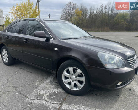 Коричневий Кіа Маджентіс, об'ємом двигуна 2 л та пробігом 170 тис. км за 6808 $, фото 2 на Automoto.ua