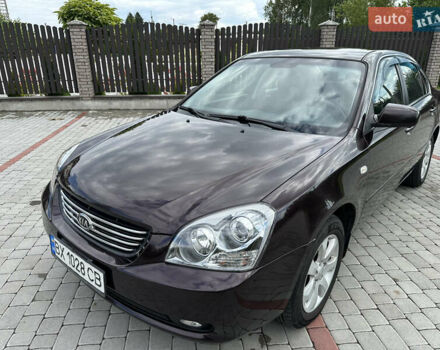 Коричневий Кіа Маджентіс, об'ємом двигуна 2 л та пробігом 255 тис. км за 5500 $, фото 11 на Automoto.ua