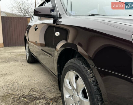 Коричневий Кіа Маджентіс, об'ємом двигуна 2 л та пробігом 157 тис. км за 5900 $, фото 16 на Automoto.ua