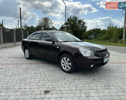 Коричневий Кіа Маджентіс, об'ємом двигуна 2 л та пробігом 255 тис. км за 5500 $, фото 6 на Automoto.ua
