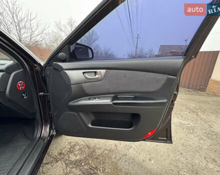 Коричневий Кіа Маджентіс, об'ємом двигуна 2 л та пробігом 157 тис. км за 5900 $, фото 32 на Automoto.ua