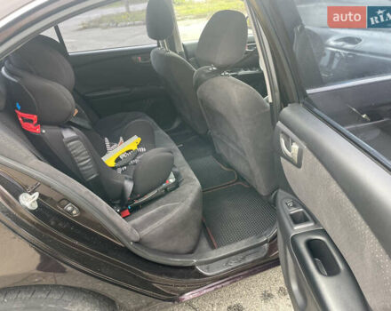 Коричневий Кіа Маджентіс, об'ємом двигуна 2 л та пробігом 170 тис. км за 6808 $, фото 10 на Automoto.ua