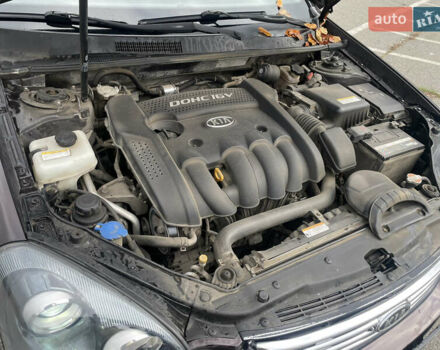 Коричневий Кіа Маджентіс, об'ємом двигуна 2 л та пробігом 170 тис. км за 6808 $, фото 13 на Automoto.ua