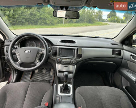 Коричневий Кіа Маджентіс, об'ємом двигуна 2 л та пробігом 255 тис. км за 5500 $, фото 27 на Automoto.ua
