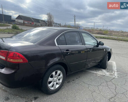 Коричневий Кіа Маджентіс, об'ємом двигуна 2 л та пробігом 170 тис. км за 6808 $, фото 3 на Automoto.ua