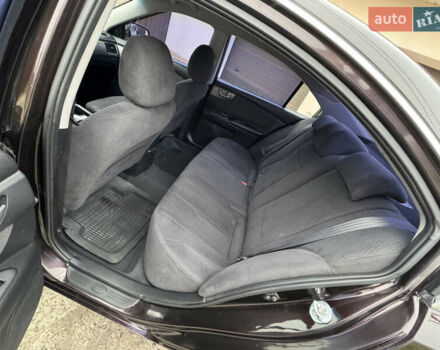 Коричневий Кіа Маджентіс, об'ємом двигуна 2 л та пробігом 157 тис. км за 5900 $, фото 29 на Automoto.ua