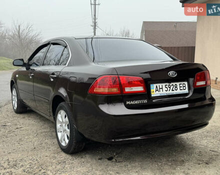 Коричневий Кіа Маджентіс, об'ємом двигуна 2 л та пробігом 157 тис. км за 5900 $, фото 5 на Automoto.ua