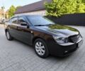 Коричневий Кіа Маджентіс, об'ємом двигуна 2 л та пробігом 165 тис. км за 5700 $, фото 1 на Automoto.ua