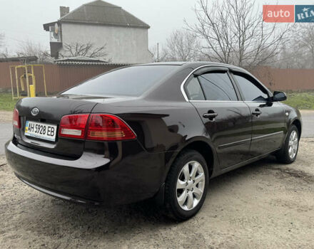 Коричневий Кіа Маджентіс, об'ємом двигуна 2 л та пробігом 157 тис. км за 5900 $, фото 8 на Automoto.ua