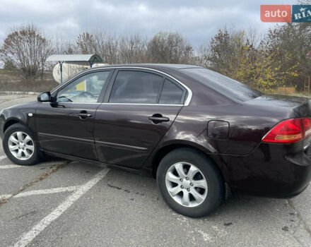 Коричневий Кіа Маджентіс, об'ємом двигуна 2 л та пробігом 170 тис. км за 6808 $, фото 4 на Automoto.ua