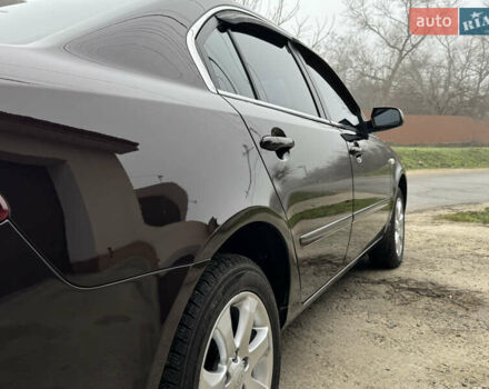 Коричневий Кіа Маджентіс, об'ємом двигуна 2 л та пробігом 157 тис. км за 5900 $, фото 15 на Automoto.ua