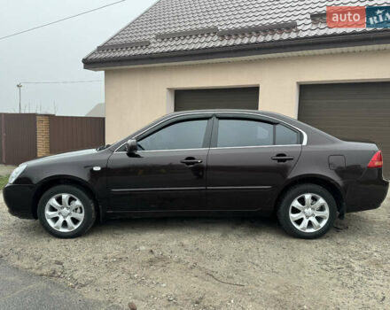 Коричневий Кіа Маджентіс, об'ємом двигуна 2 л та пробігом 157 тис. км за 5900 $, фото 3 на Automoto.ua