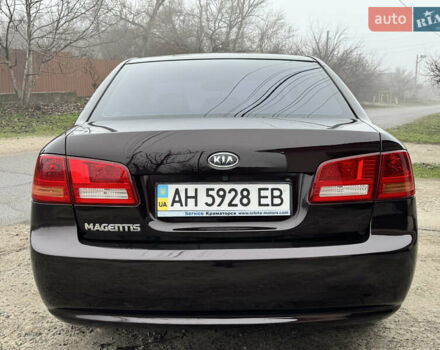 Коричневий Кіа Маджентіс, об'ємом двигуна 2 л та пробігом 157 тис. км за 5900 $, фото 6 на Automoto.ua