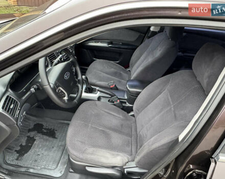 Коричневий Кіа Маджентіс, об'ємом двигуна 2 л та пробігом 157 тис. км за 5900 $, фото 21 на Automoto.ua