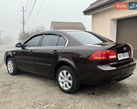 Коричневий Кіа Маджентіс, об'ємом двигуна 2 л та пробігом 157 тис. км за 5900 $, фото 4 на Automoto.ua