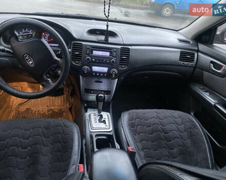 Коричневий Кіа Маджентіс, об'ємом двигуна 2 л та пробігом 245 тис. км за 4000 $, фото 5 на Automoto.ua