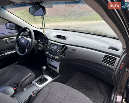 Коричневий Кіа Маджентіс, об'ємом двигуна 2 л та пробігом 157 тис. км за 5900 $, фото 23 на Automoto.ua