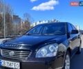 Коричневый Киа Маджентис, объемом двигателя 2 л и пробегом 230 тыс. км за 5500 $, фото 1 на Automoto.ua