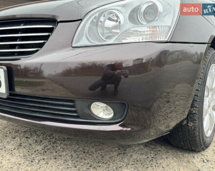 Коричневий Кіа Маджентіс, об'ємом двигуна 2 л та пробігом 157 тис. км за 5900 $, фото 18 на Automoto.ua