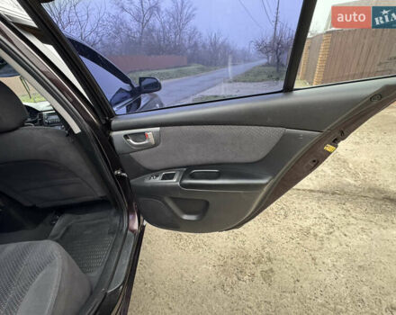 Коричневий Кіа Маджентіс, об'ємом двигуна 2 л та пробігом 157 тис. км за 5900 $, фото 33 на Automoto.ua