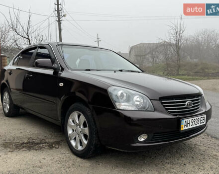 Коричневий Кіа Маджентіс, об'ємом двигуна 2 л та пробігом 157 тис. км за 5900 $, фото 11 на Automoto.ua