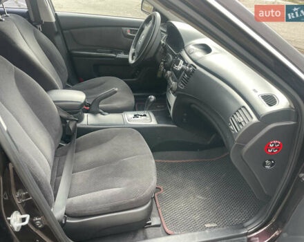 Коричневий Кіа Маджентіс, об'ємом двигуна 2 л та пробігом 170 тис. км за 6808 $, фото 11 на Automoto.ua