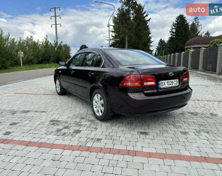 Коричневий Кіа Маджентіс, об'ємом двигуна 2 л та пробігом 255 тис. км за 5500 $, фото 3 на Automoto.ua