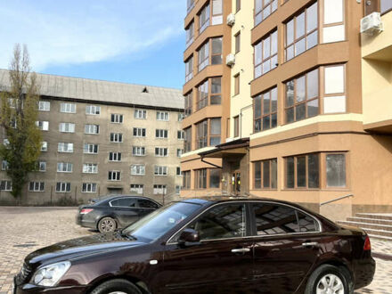 Коричневый Киа Маджентис, объемом двигателя 2 л и пробегом 192 тыс. км за 5900 $, фото 1 на Automoto.ua