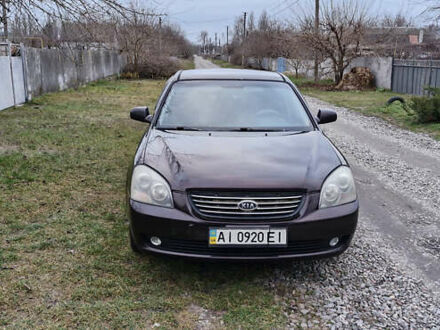 Коричневий Кіа Маджентіс, об'ємом двигуна 2 л та пробігом 458 тис. км за 4900 $, фото 1 на Automoto.ua