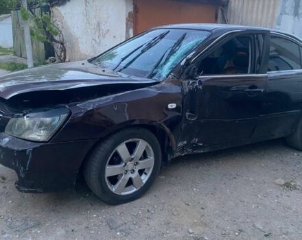 Коричневый Киа Маджентис, объемом двигателя 2.7 л и пробегом 200 тыс. км за 2000 $, фото 1 на Automoto.ua