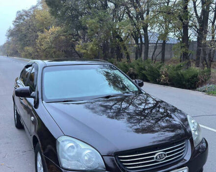 Коричневий Кіа Маджентіс, об'ємом двигуна 2 л та пробігом 225 тис. км за 5500 $, фото 1 на Automoto.ua