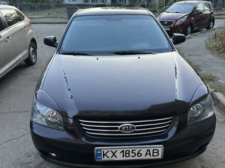 Коричневий Кіа Маджентіс, об'ємом двигуна 2 л та пробігом 180 тис. км за 5800 $, фото 1 на Automoto.ua