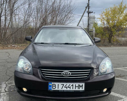Коричневий Кіа Маджентіс, об'ємом двигуна 2 л та пробігом 170 тис. км за 6808 $, фото 1 на Automoto.ua