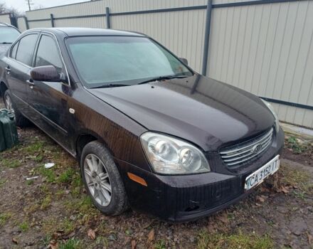 Коричневий Кіа Маджентіс, об'ємом двигуна 2 л та пробігом 200 тис. км за 2700 $, фото 1 на Automoto.ua