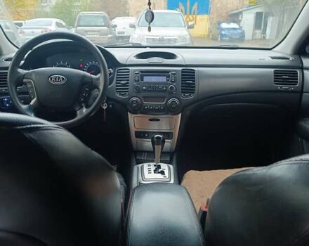 Кіа Маджентіс 2007 у Києві на Automoto.ua Червоний Кіа Маджентіс, об'ємом двигуна 2 л та пробігом 235 тис. км за 5000 $, фото 4 на Automoto.ua