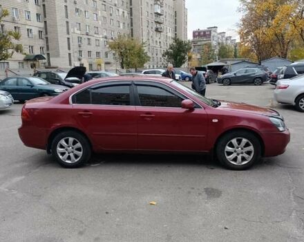 Кіа Маджентіс 2007 у Києві на Automoto.ua Червоний Кіа Маджентіс, об'ємом двигуна 2 л та пробігом 235 тис. км за 5000 $, фото 9 на Automoto.ua