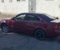 Красный Киа Маджентис, объемом двигателя 2 л и пробегом 339 тыс. км за 3200 $, фото 1 на Automoto.ua