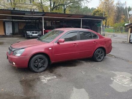 Кіа Маджентіс 2007 у Києві на Automoto.ua Червоний Кіа Маджентіс, об'ємом двигуна 2 л та пробігом 235 тис. км за 5000 $, фото 1 на Automoto.ua