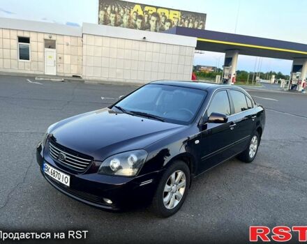 Красный Киа Маджентис, объемом двигателя 2 л и пробегом 23000 тыс. км за 3500 $, фото 1 на Automoto.ua