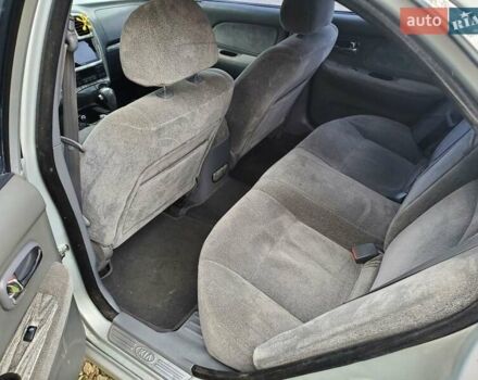 Киа Маджентис, объемом двигателя 2 л и пробегом 267 тыс. км за 3400 $, фото 6 на Automoto.ua
