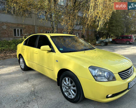 Жовтий Кіа Маджентіс, об'ємом двигуна 2 л та пробігом 257 тис. км за 4300 $, фото 3 на Automoto.ua