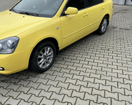 Жовтий Кіа Маджентіс, об'ємом двигуна 2 л та пробігом 269 тис. км за 5000 $, фото 4 на Automoto.ua