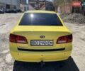 Желтый Киа Маджентис, объемом двигателя 2 л и пробегом 250 тыс. км за 5200 $, фото 1 на Automoto.ua