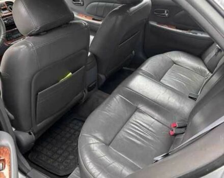 Серый Киа Маджентис, объемом двигателя 2.5 л и пробегом 335 тыс. км за 1800 $, фото 4 на Automoto.ua