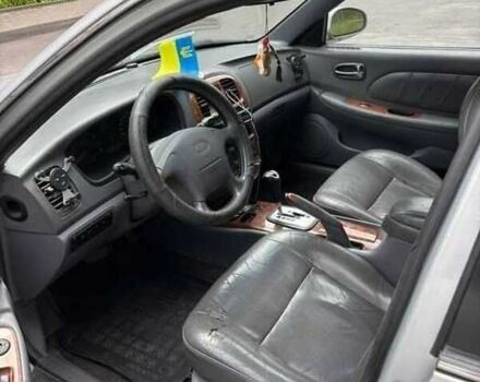 Сірий Кіа Маджентіс, об'ємом двигуна 2.5 л та пробігом 335 тис. км за 1800 $, фото 2 на Automoto.ua