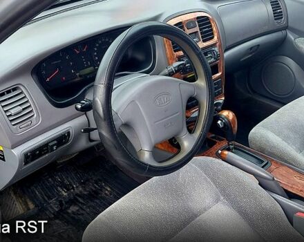 Сірий Кіа Маджентіс, об'ємом двигуна 2 л та пробігом 280 тис. км за 2700 $, фото 8 на Automoto.ua