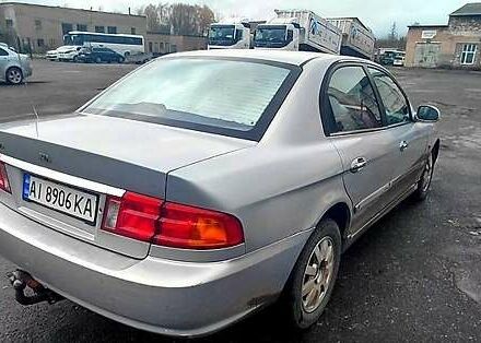 Серый Киа Маджентис, объемом двигателя 2 л и пробегом 290 тыс. км за 2700 $, фото 2 на Automoto.ua